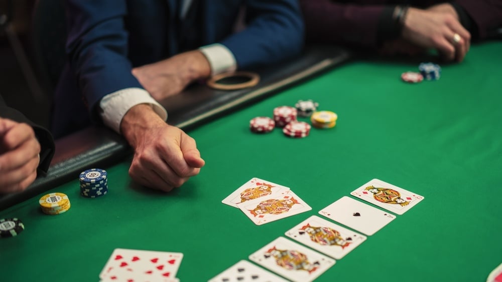 Poker table with hand of cards