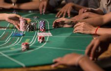 Player winning chip by betting baccarat with banker hand