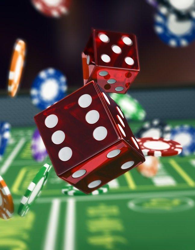 Chips and dice on a craps table background