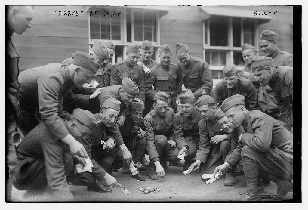 Men in the army playing craps