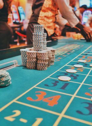 A casino table with a lot of chips on it