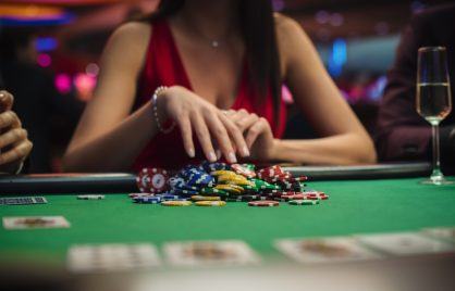 Woman playing poker for the ICM in poker article.