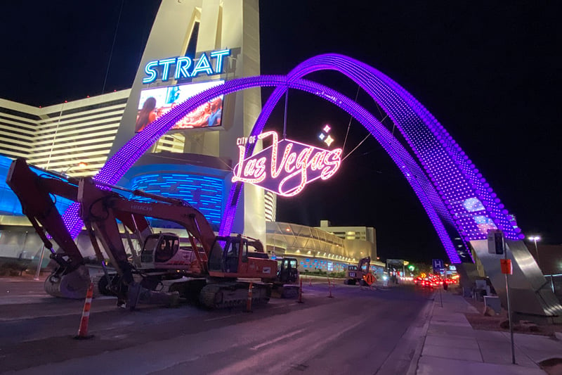 Las Vegas' sparkling purple arches contrast the one in St. Louis